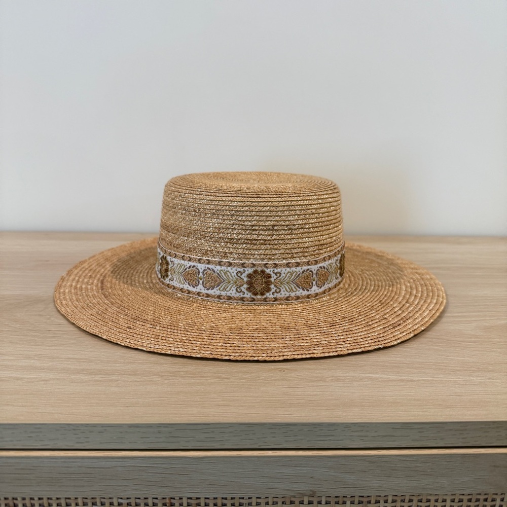 Elegant Tan Straw Hat with Patterned Band